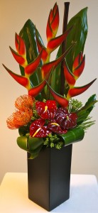 a4b1cc39b5406fe35ecbb0a61fb095bc--tropical-floral-arrangements-tropical-flowers.jpg